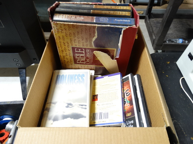 lot 6527 image: Box with bible on casseetes and VHS tapes.