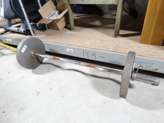 lot 6556 image: Curl bar with weights.