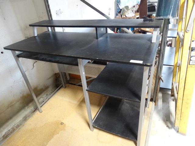 lot 6567 image: Computer desk with wood top and metal frame.