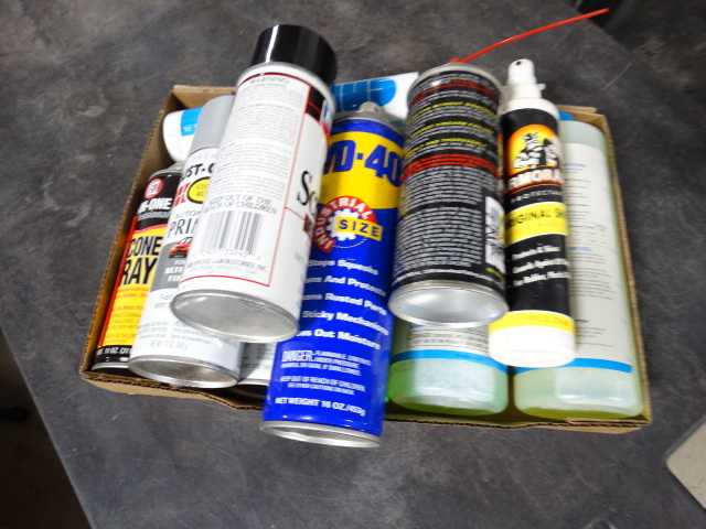 lot 6582 image: Lot with mold and mildew cleaner, WD-40, gun cleaner, gun scrubber and more.