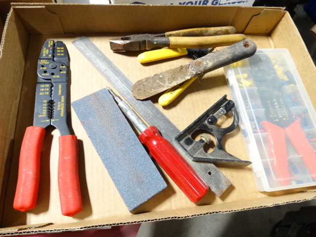 lot 6583 image: Lot with wire strippers, wire cutters, plierswire cutters, combination square and more.