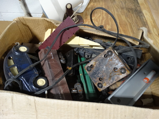 lot 6633 image: Small box of vintage toy cars and trains.