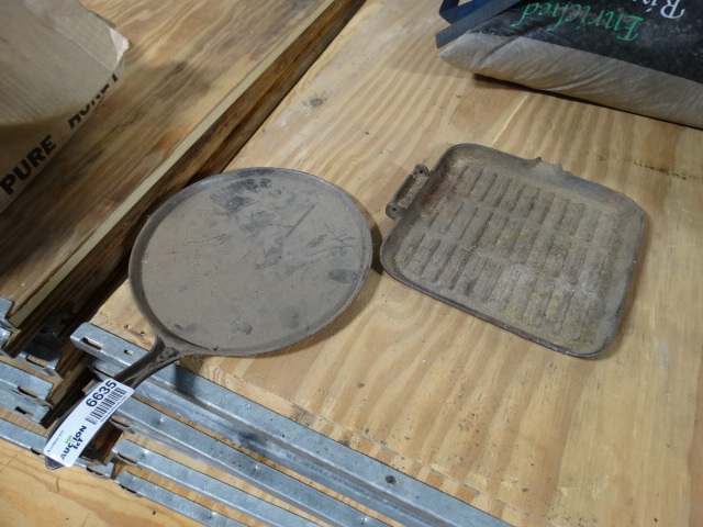 lot 6635 image: 2 Small cast iron griddles.