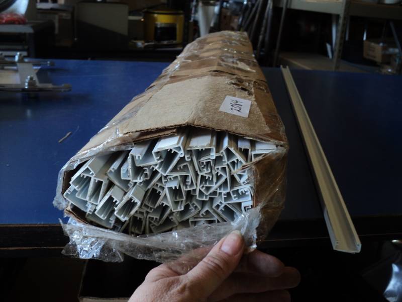 lot 8657 image: (50) pieces white vinyl trim with adhesive back, 1 x 39-12