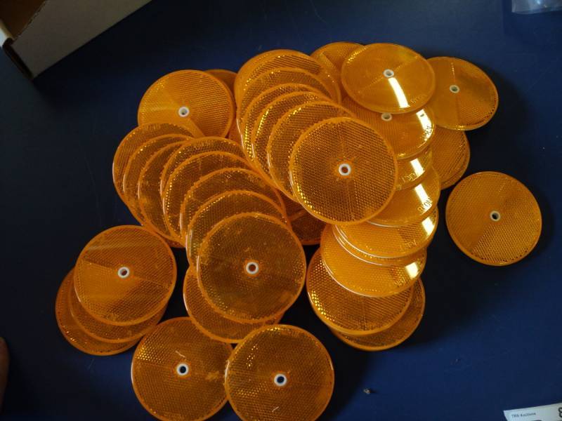 lot 8705 image: (55) ct lot orange reflectors 2-14 diameter