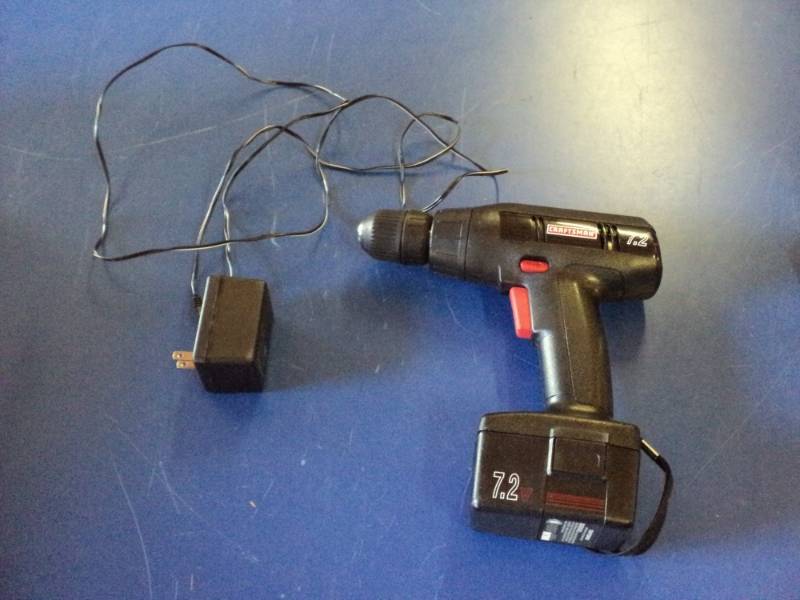 lot 8745 image: Craftsman 7.2 volt cordless drill with charger, powers on