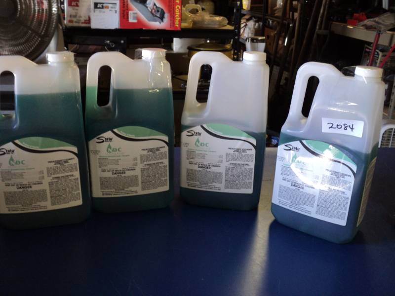 lot 8761 image: (4) bottles State NDC Neutral Disinfectant Cleaner, Morning Fresh, (2) bottles are open, pictured
