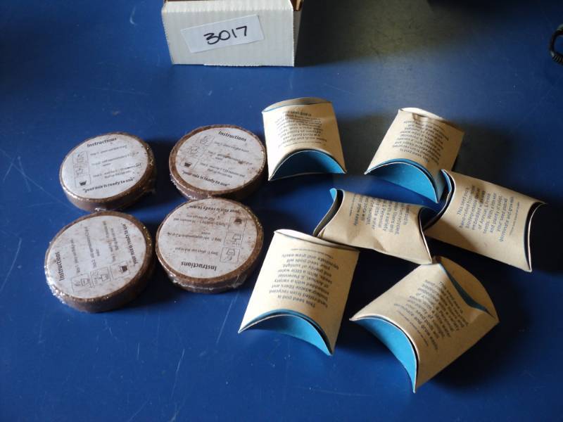 lot 8799 image: (10) ct mixed lot, (4)coir planting discs, (6) seed pods with variety of annual and perrenial seeds