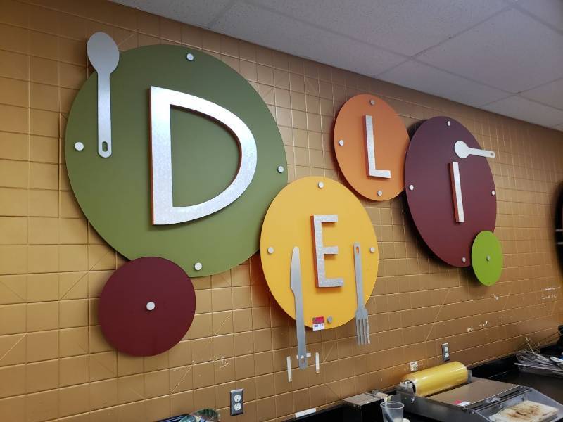 lot 8528 image: Deli sign