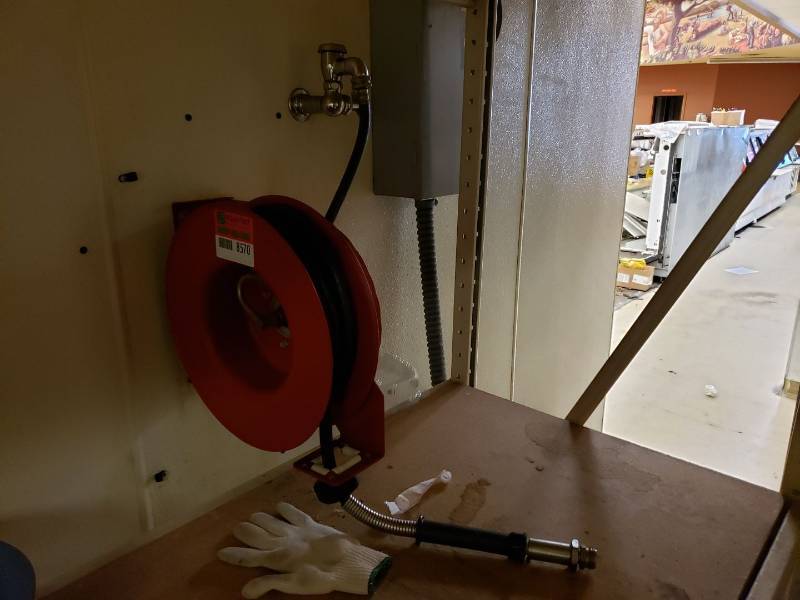 lot 8570 image: Water hose and reel