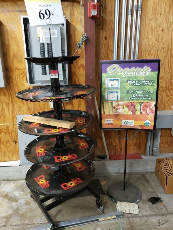 lot 8600 image: Display rack and sign