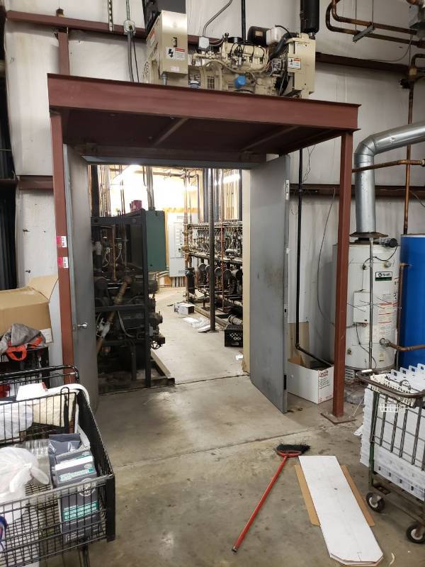 lot 8640 image: Metal frame holding generator