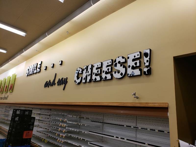 lot 8690 image: Smile and say cheese sign
