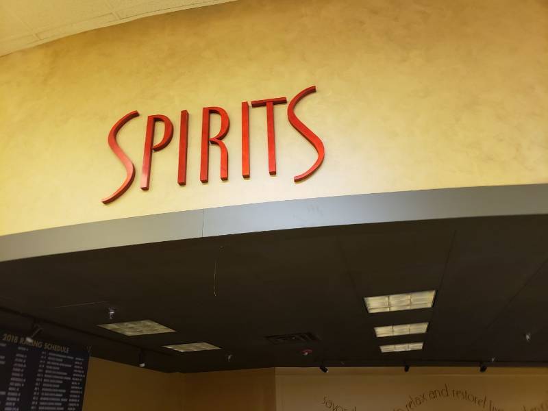 lot 8691 image: Spirits and Wine sign