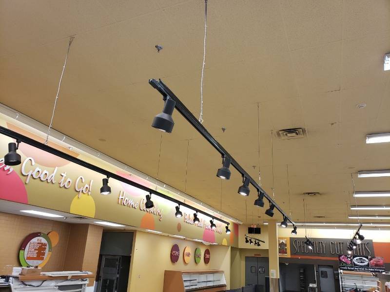 lot 8699 image: (5) hanging spot light strips above produce area