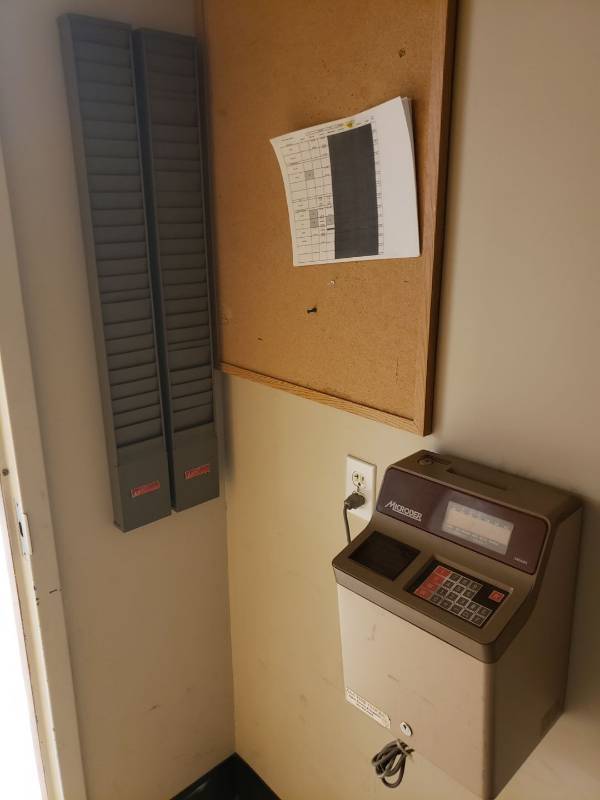 lot 8742 image: Microder time clock with time card holder