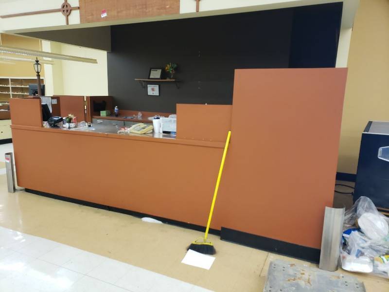 lot 8756 image: Front and back customer service counters