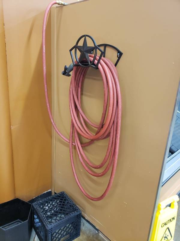 lot 2194 image: watering hose with sprayer