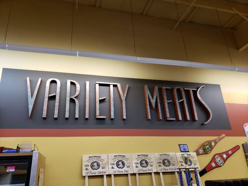 lot 2225 image: Variety Meats sign