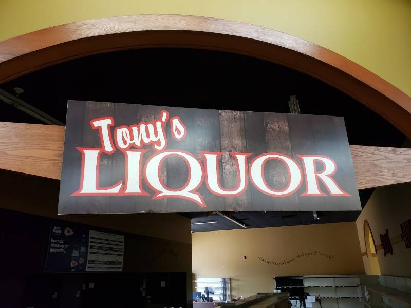 lot 2273 image: Tonys liquor sign