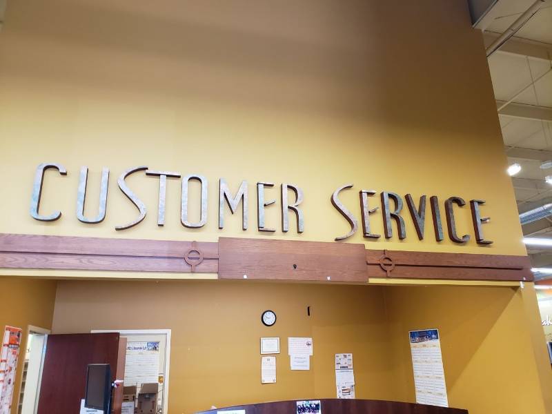 lot 2277 image: Customer service sign