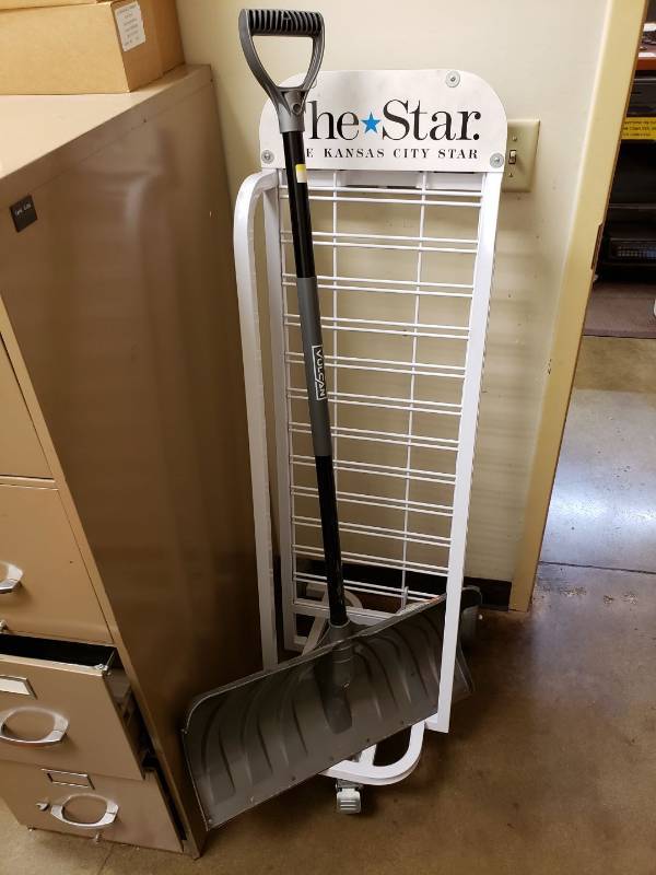 lot 2283 image: snow shovel and newspaper rack