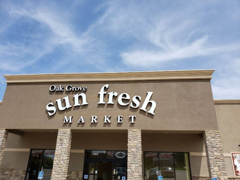 lot 2297 image: Oak Grove Sun Fresh Market sign
