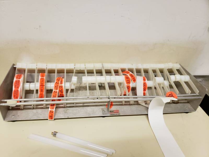 lot 2312 image: Heat seal tag dispenser