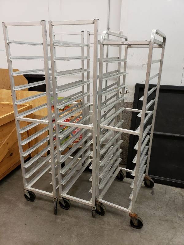 lot 2342 image: (3) aluminum rolling racks