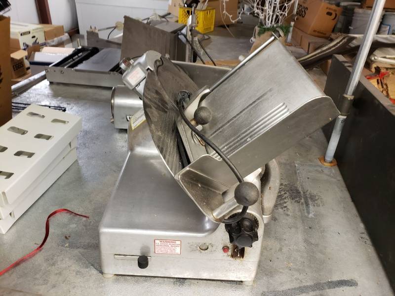 lot 2389 image: Berkeley 818 automatic meat slicer with sharpener