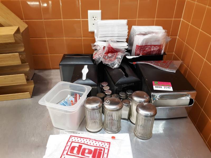 lot 2542 image: Napkin Dispenser, Sugar and Salt and Pepper Shakers, Deli Bags and Wax Bags