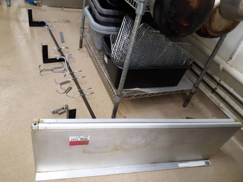 lot 2562 image: 36 in Wall-Mount Shelf with Ticket Holder and 54 in Pan Rack