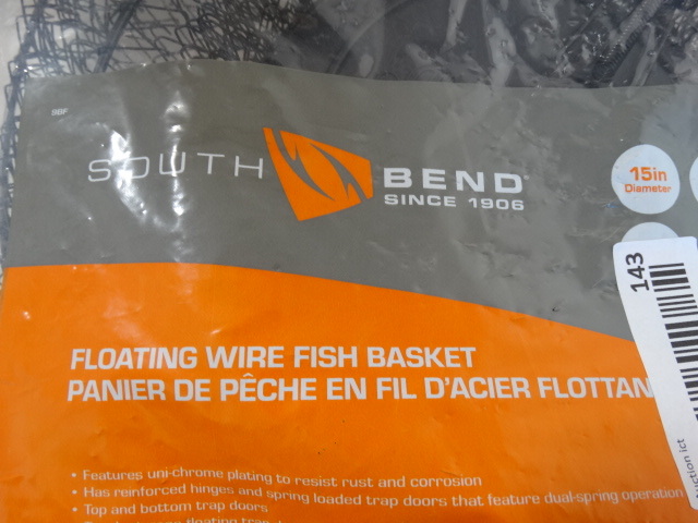 lot 143 image: South bend floating wire fish basket.