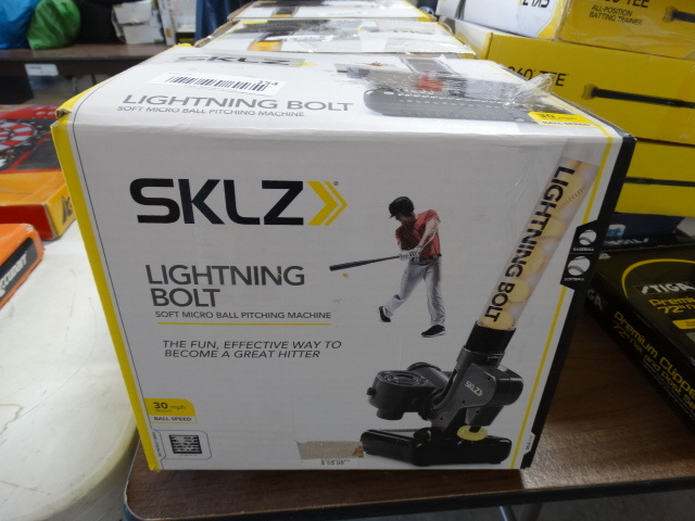lot 154 image: SKLZ lighting bolt soft micro ball pitching machine. 30mph.