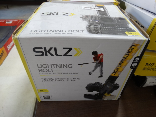 lot 155 image: SKLZ lighting bolt soft micro ball pitching machine. 30mph.