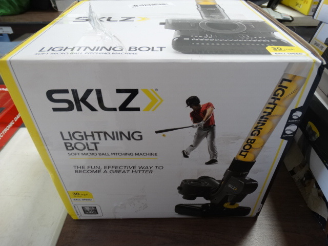lot 156 image: SKLZ lighting bolt soft micro ball pitching machine. 30mph.