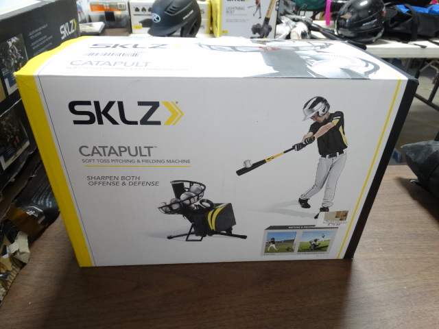 lot 166 image: SKLZ catapult soft toss pitching & fielding machine.