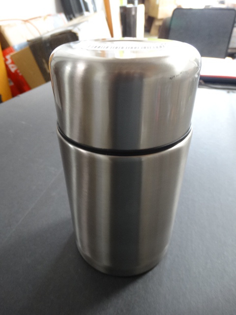 lot 228 image: 33oz fiftyfifty vacuum bottle.