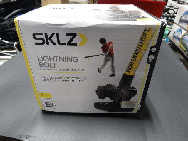 lot 278 image: SKLZ lightening bolt soft micro ball pitching machine.