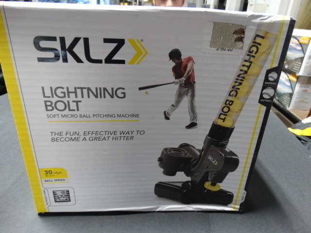 lot 279 image: SKLZ lightening bolt soft micro ball pitching machine.