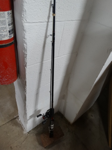 lot 394 image: Ugly stik Gx2 pole and shakespeare reel.