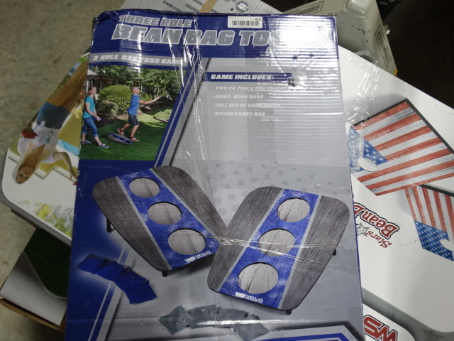 lot 418 image: Wild sports three hole bean bag toss game.