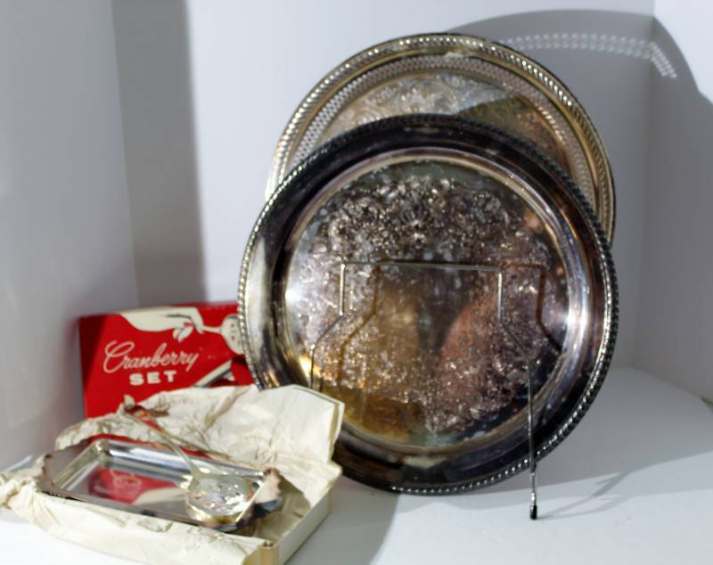 lot 1044 image: Two silver plate platters and cranberry set