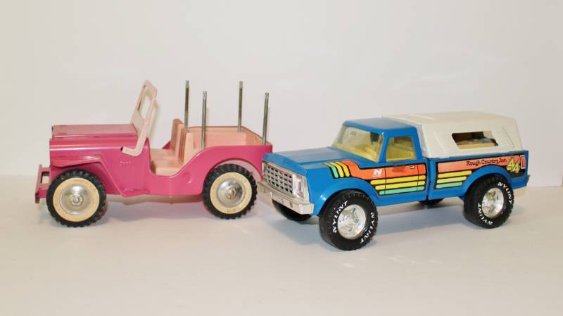 lot 1117 image: Vintage Pink Tonka Jeep and Nylint Truck
