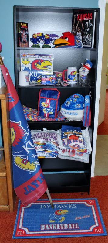 lot 1168 image: Huge Jayhawk Fan Lot - flag, 22 tshirts, hats, books, bags, figurines and much more