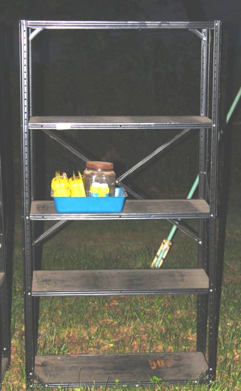 lot 1233 image: Metal utility shelf with contents