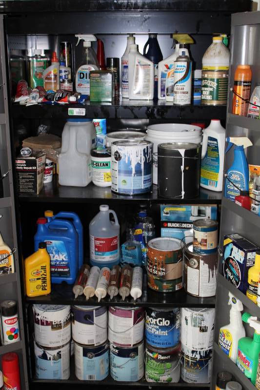 lot 1274 image: Contents of cabinet - lots of paint, cleaning supplies, car coolant, oil etc... CABINET NOT INCLUDED.