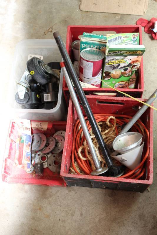 lot 1278 image: Large casters, three vintage oil funnels, metal weights, extension cord, rope, steel pipes and other misc garage items.