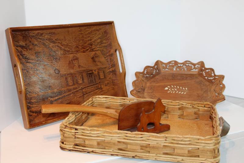 lot 1315 image: Wood Serving trays and wickerrattan basket with leather like handles