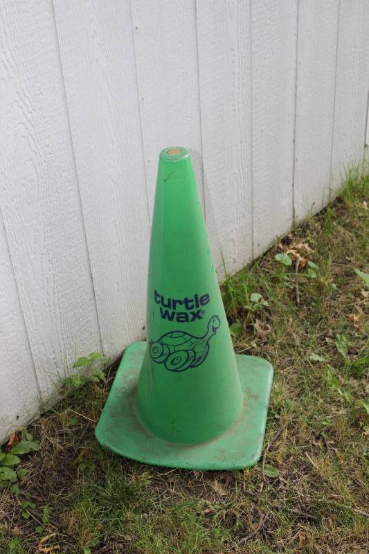 lot 1342 image: Green Turtle Wax Cone, Rubber Door Mat and container of 10 glass vases
